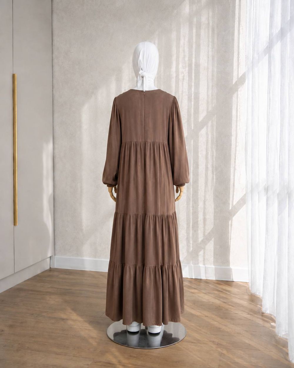 Brown tiered maxi dress with gathered sleeves